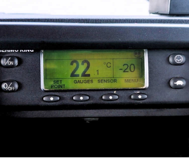 Thermo truck loading cold chain cargo at dock