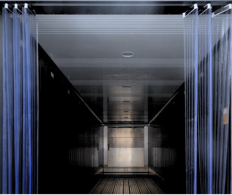 Thermo truck loading cold chain cargo at dock