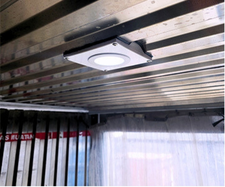 Thermo truck loading cold chain cargo at dock